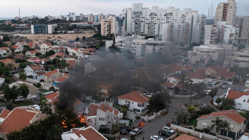 Rocket barrages strike southern Israel in operation claimed by Hamas, Netanyahu says Israel is 'at war'